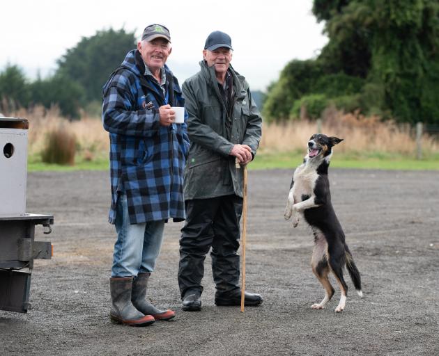Eddie Conlan (left) has a cuppa with fellow triallist Russell Peek and his dog, Rose, at the...