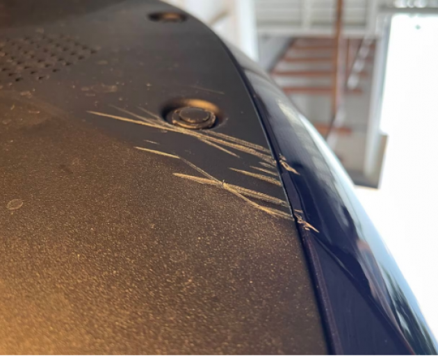 Deep scratches on the bumper of Reza's new Tesla. Photo: Supplied