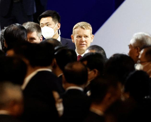 New Zealand Prime Minister Chris Hipkins leaves following the opening session of the World...