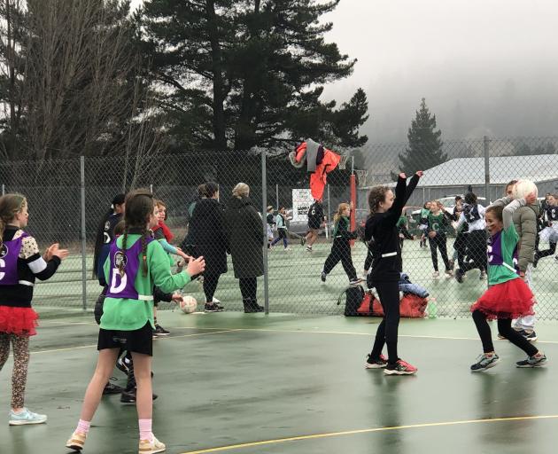 Devon Tamariki (10), of Shotover Primary School, passes the ball at the Netty Festival netball...