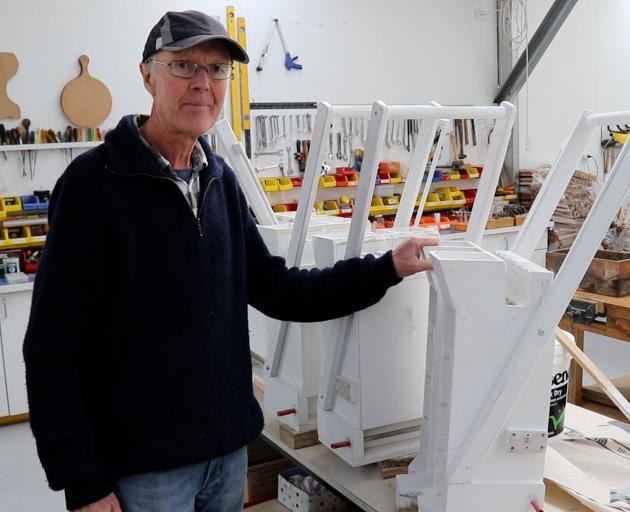 Alistair Smithies in the workshop area with refurbished croquet trolleys. PHOTO: JOHN SPURDLE