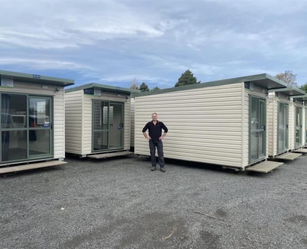 Mt Hutt Ski Area manager James Mckenzie in front of new cabins for ski crews.