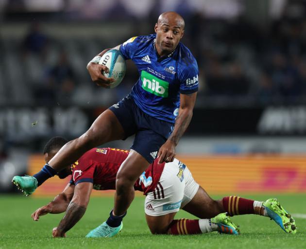 Prolific Blues winger Mark Telea leaves his Highlanders counterpart, Jona Nareki, in his wake...