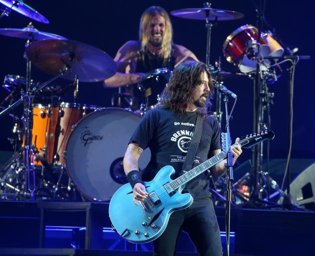 Dave Grohl and the late Taylor Hawkins during the band's last trip to New Zealand in 2018. Photo:...