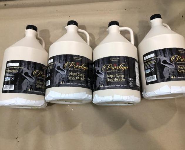 Methamphetamine was concealed in bottles of maple syrup. Photo: NZ Police