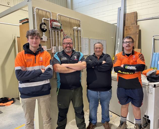 Three generations of electricians (from left) Jai, Mark, Mike and Case Rawson, of Oamaru. PHOTO:...