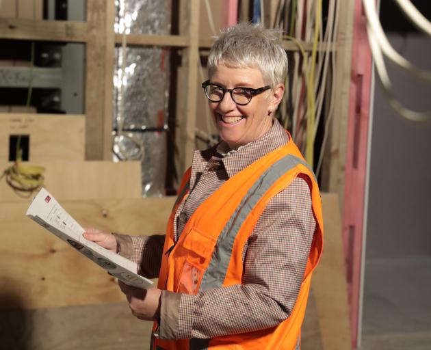 Southland Charity Hospital board member Janet Copeland is happy with the progress of the facility...