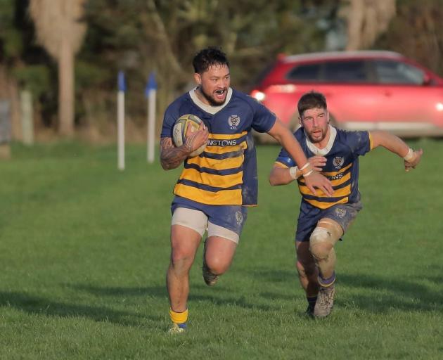 Mikal Tuari (Toko) has Dion Shaw in support as he makes a break during the game against Clutha...