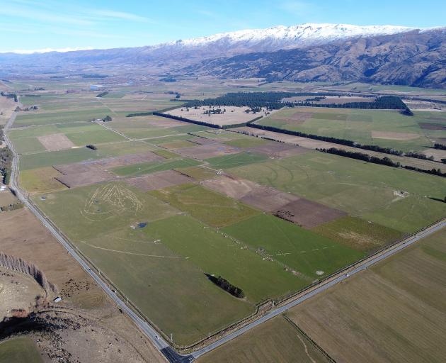 The site of the proposed Tarras airport looking towards Lake Dunstan bounded by State Highway 8 ...