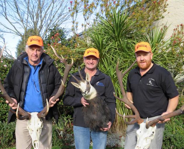 New Zealand Deerstalkers Association (NZDA) immediate-past branch presidents, Graeme Williams (of...
