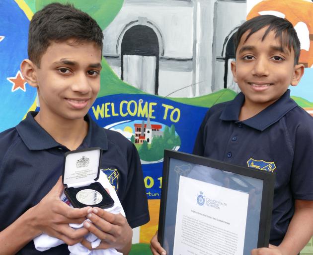 Kalya Kandegoda Gamage holds the Mountbatten Medal for bravery, which he received in a special...