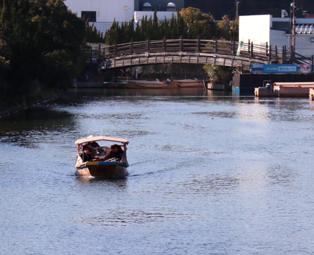 Traditional boats tour Matsue’s historical district.