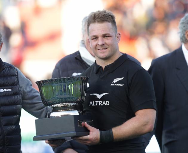 Sam Cane, pictured posing with the trophy after the All Blacks 41-12 win over Argentina, wrote...