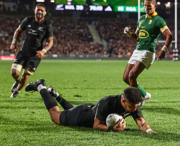 Richie Mo'unga dives over easy to score a try late in the second half. Photo: Getty Images