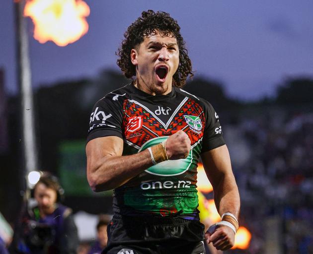 Dallin Watene-Zelezniak of the Warriors celebrates his try. Photo: Getty Images