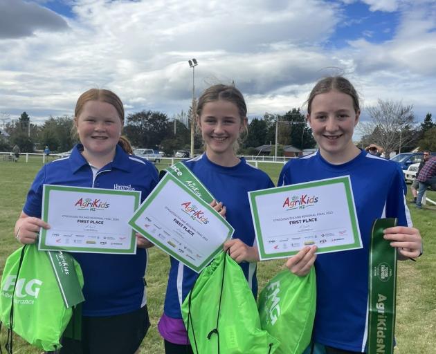 Three Western Girls team members (from left) Sierra Bennett, Elly Hurley and Sophie Parris, of...