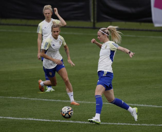 Sweden's Amanda Ilestedt (right) with teammates during training. Photo: Reuters 