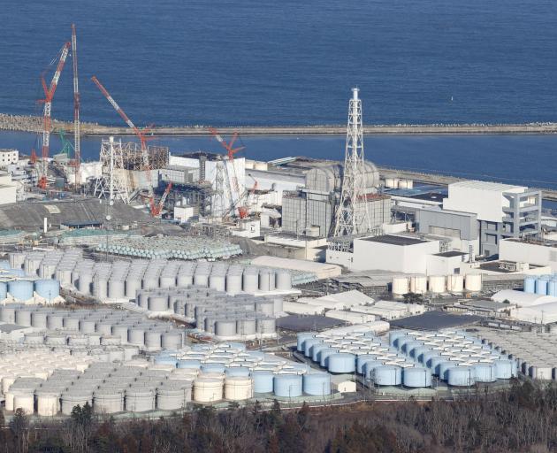 An aerial view shows storage tanks for treated water at the tsunami-crippled Fukushima Daiichi...