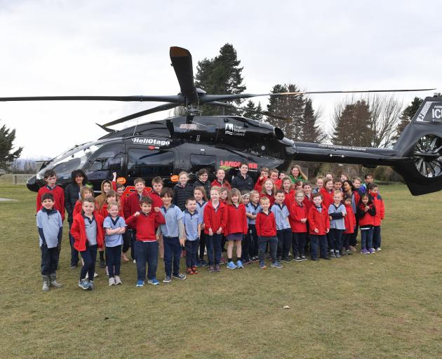 Omakau School pupils with an Otago Southland Rescue Helicopter.