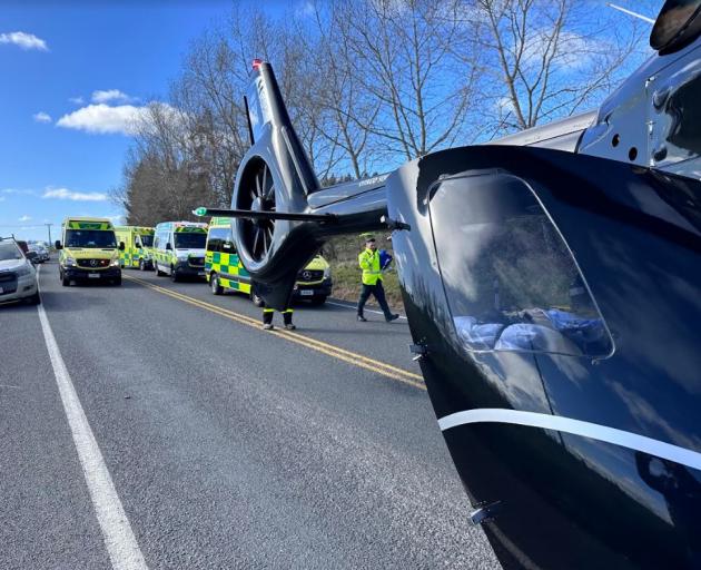 Emergency services at the scene of the crash this afternoon. Photo: Stephen Jaquiery / ODT
