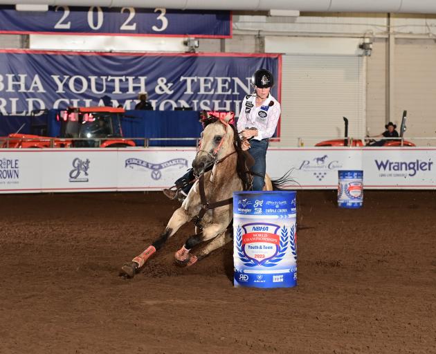Alexandra cowgirl Sky Sanders, 15, competes in the barrel race event in the US state of Georgia...