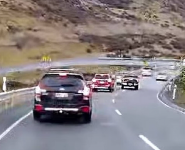 A ute driver was caught on dashcam footage almost colliding head-on with a car during a dangerous...