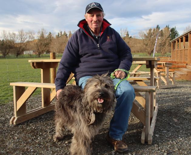Ross Hurrell of Waikaka Valley bought Mei Anzac, a beardie pup, at the dog sale held during the...