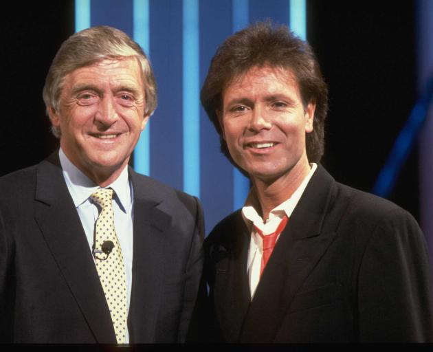 Sir Michael Parkinson with Sir Cliff Richard in 1988. Photo: Getty Images