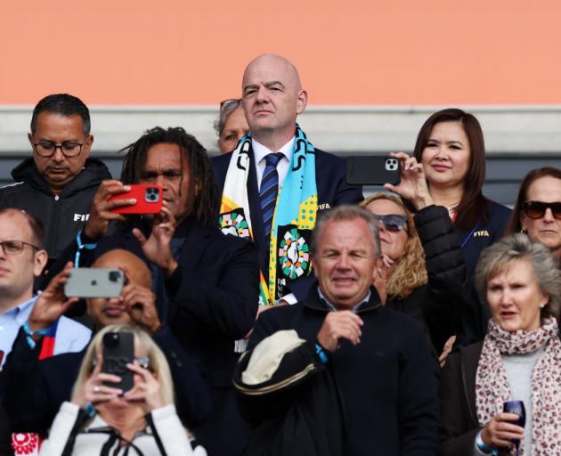 Gianni Infantino (centre) at the match between USA and Vietnam at Auckland's Eden Park last month...