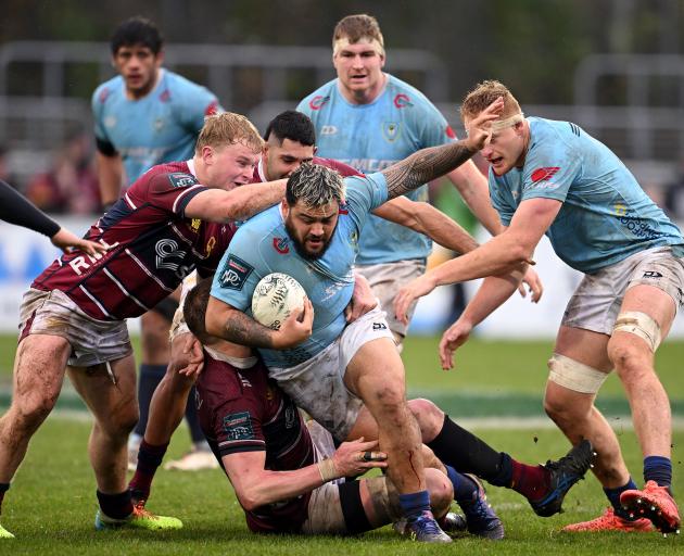 Jarred Adams of Northland charges forward during today's round two NPC match between Southland...