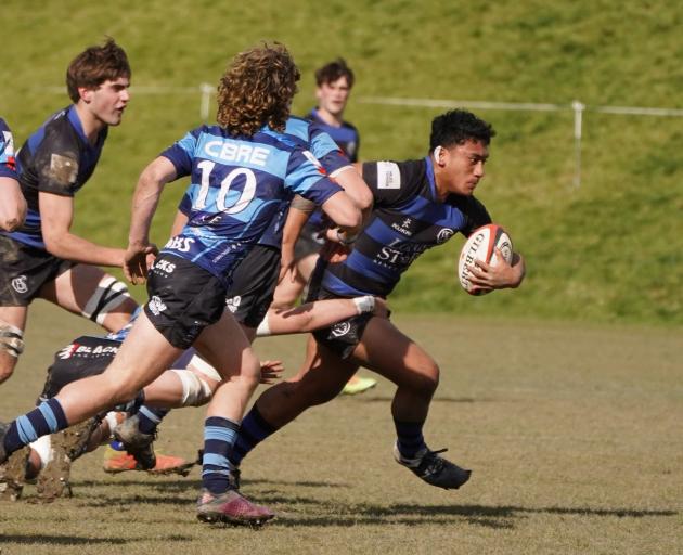 CBHS hooker Manumaua Letiu makes a break in Saturday’s final against Nelson College. Photo: Liz...