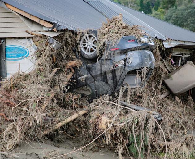 A car parked by Cyclone Gabrielle in Hawke’s Bay. PHOTO: HAWKE’S BAY TODAY