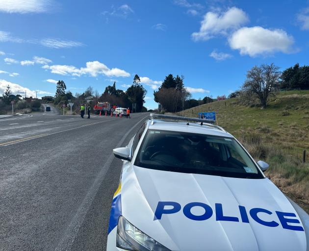 Police at the scene of the crash. Photo: Gregor Richardon