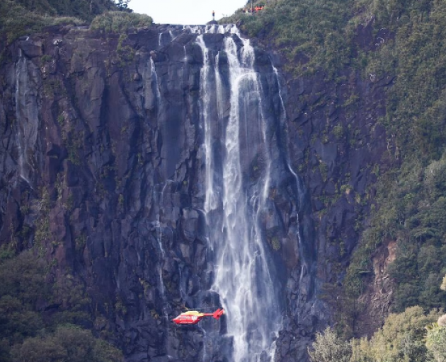 A helicopter searched the Wairere Falls area today. Photo: NZ Herald 