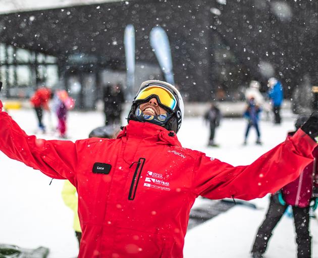 The Remarkables ski instructor Luca Mirabo celebrates as   snow begins falling on the ski area on Tuesday. Photo: Rachel Kind/The Remarkables