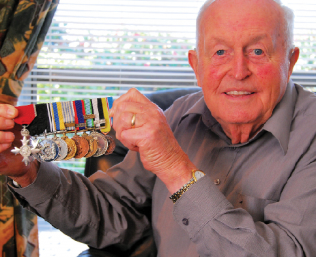 Forbes with his medals in 2013. Photo: Supplied