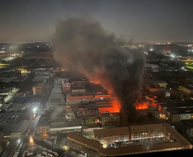 Smoke rises from the burning in this image obtained from social media. X/@odirileram/via Reuters