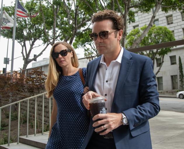 Actor Danny Masterson arrives at court in Los Angeles with wife Bijou Phillips. Photo: Getty Images