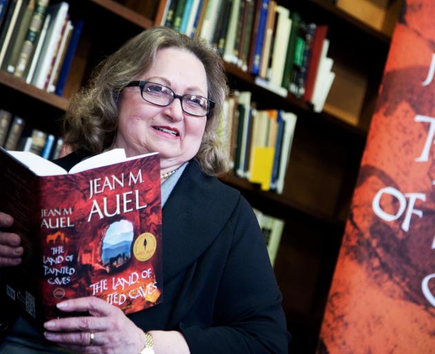 Jean M. Auel, author of the Earth’s Children series, with the last book in the series, The Land...