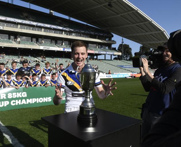 Captain Jarred Percival is unable to hide his delight after claiming the National Club Cup title...