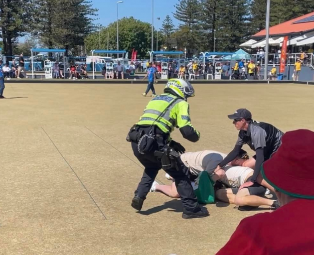 Police caught up with the man after Kelly took him down. Photo: Alis Butten/Sporting Highlights 