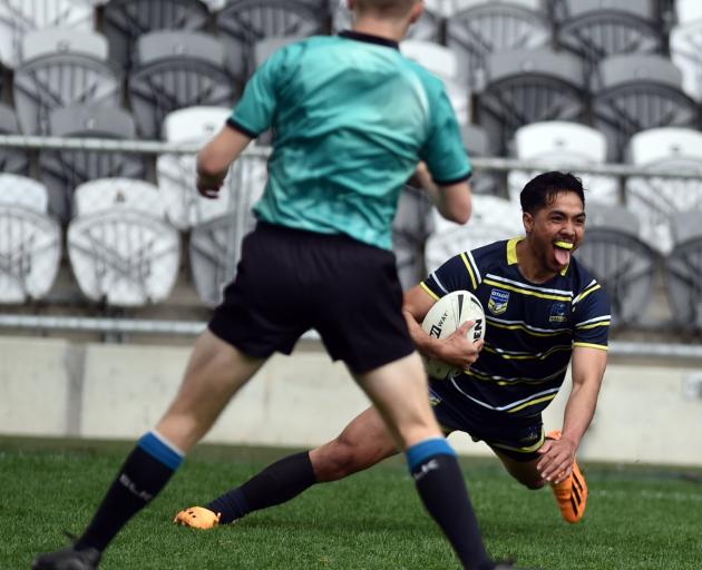 Otago Whalers winger Sala Fifita is all smiles as he scores a try in the match against Canterbury...