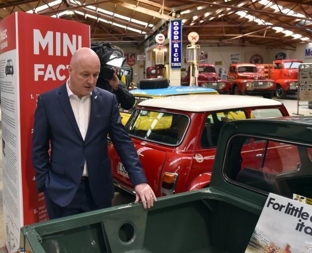 National Party leader Christopher Luxon casts an eye over a Mini pick-up at Bill Richardson...