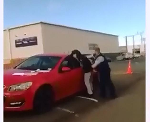A still from a video of an alleged assault by police. PHOTO: SUPPLIED