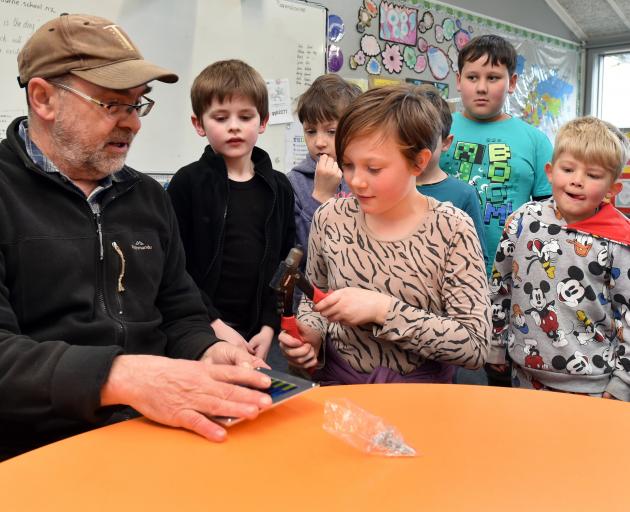 Dunedin artist Robert Scott teaches Ravensbourne School pupils (from left) Jack O'Neill, 6, Leo...
