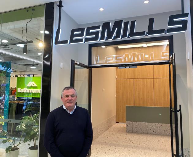 Les Mills Dunedin manager Peter Lee stands at the ground-floor entrance to the new Les Mills club...