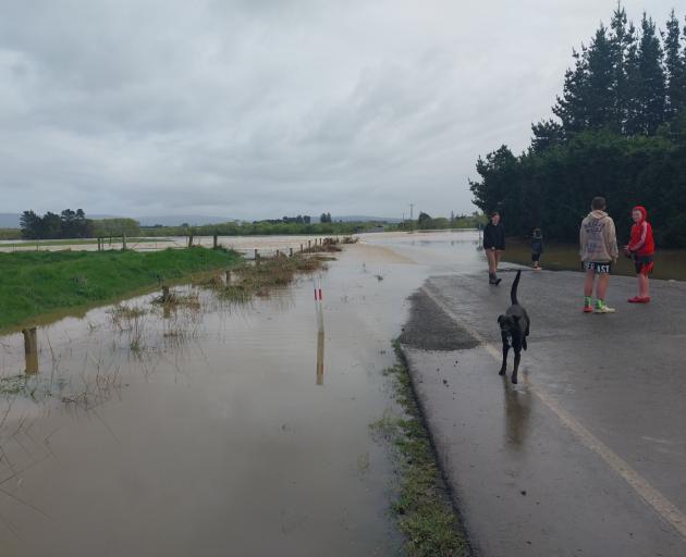 Thornbury residents have been cut off after the Aparima River overflowed. Photo: Mark John