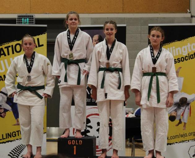 Zara Kirkpatrick on the podium at nationals where she won two gold medals.