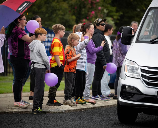 The hearse was driven past her school - Tuakau Primary - during this morning's procession. Photo ...