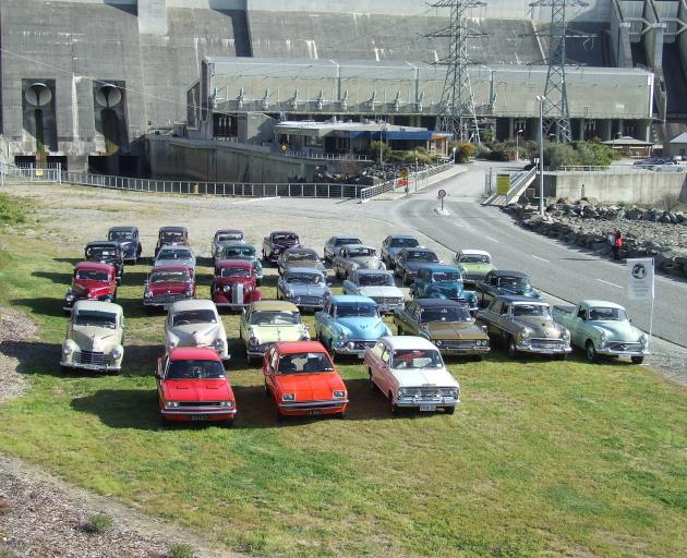 A fleet of Vauxhall cars visits the Clyde Dam at a previous National Vauxhall Rally. PHOTO: SUPPLIED